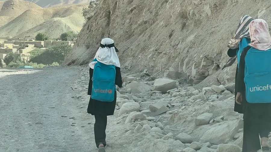 School girls walking by side the road in Badghis - OTED